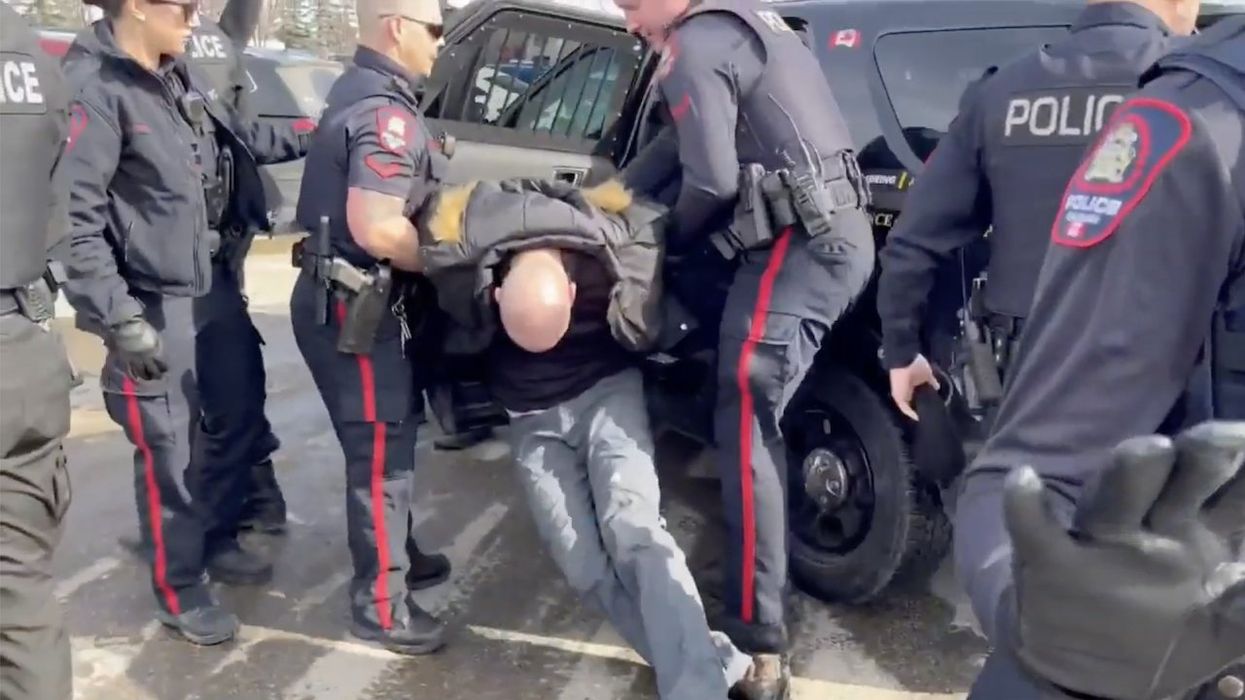 10 cops arrest pastor as he protests drag queen reading for kids; he spends Easter in jail — his latest stint behind bars for standing up to such events in Canada