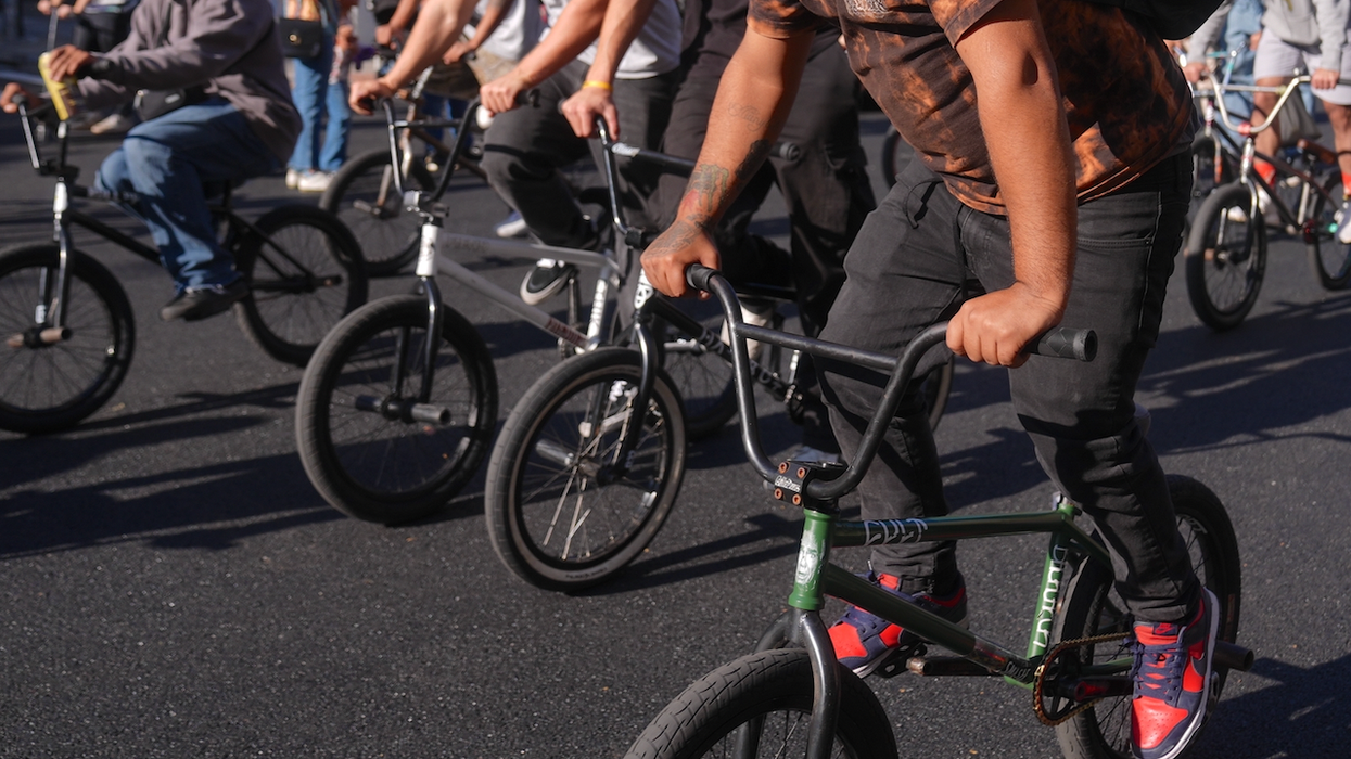 2 teens arrested after bike-riding mob ganged up on lone victim, viciously punching, kicking, stomping him in broad daylight