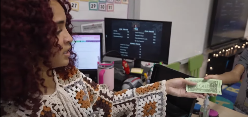3rd-grade teacher goes viral for teaching kids financial literacy by charging them 'rent' and issuing 'fines' — in classroom bucks — for misbehavior