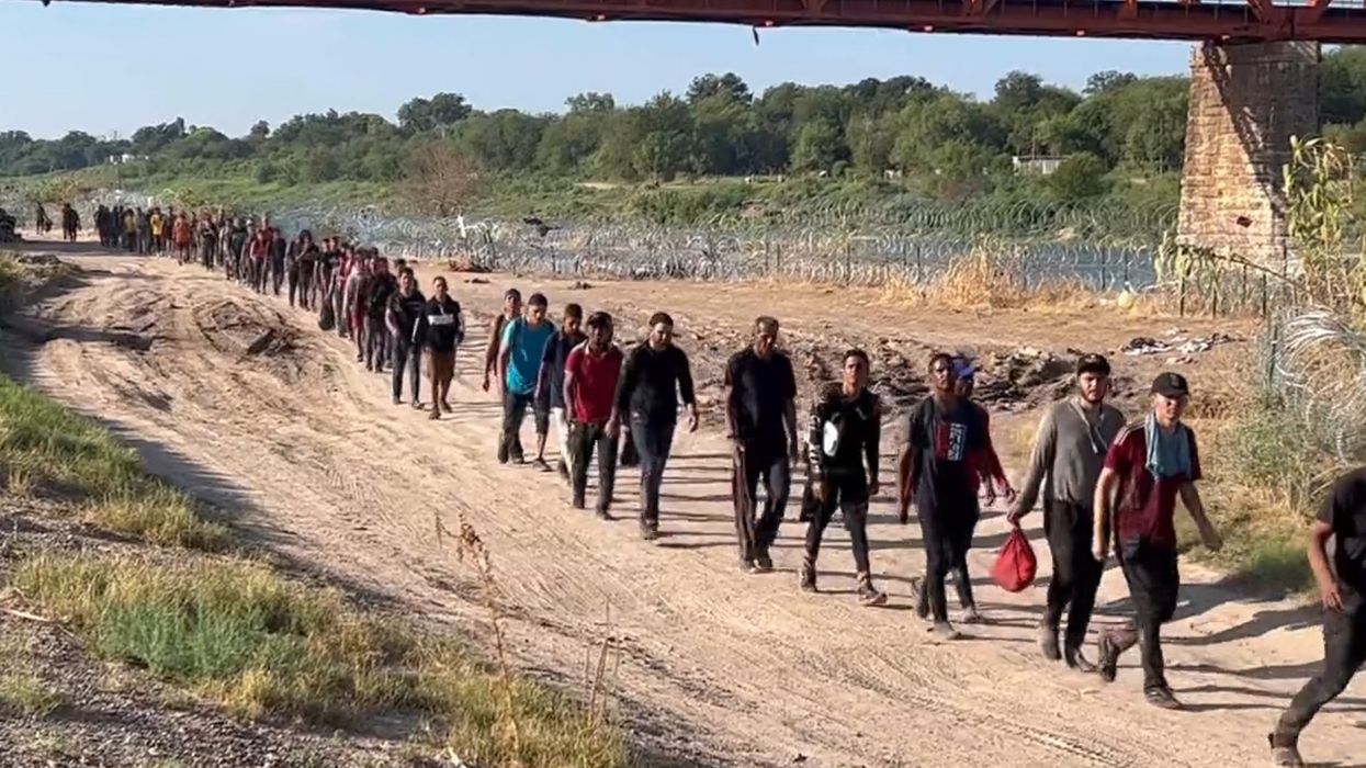 Abbott doubles down on 'invasion' declaration and vows to reinstall defenses after Eagle Pass declares state of emergency: 'Not all of these people come in peace'