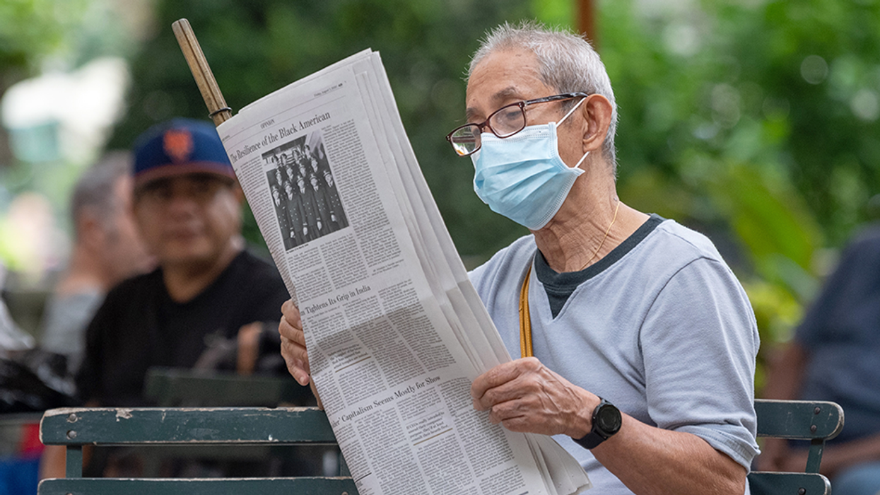 'Absolutely' keep wearing masks 'everywhere,' urges New York Times