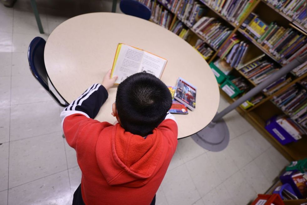 ACLU fights to restore woke books Trump banned to protect military kids from gender ideology