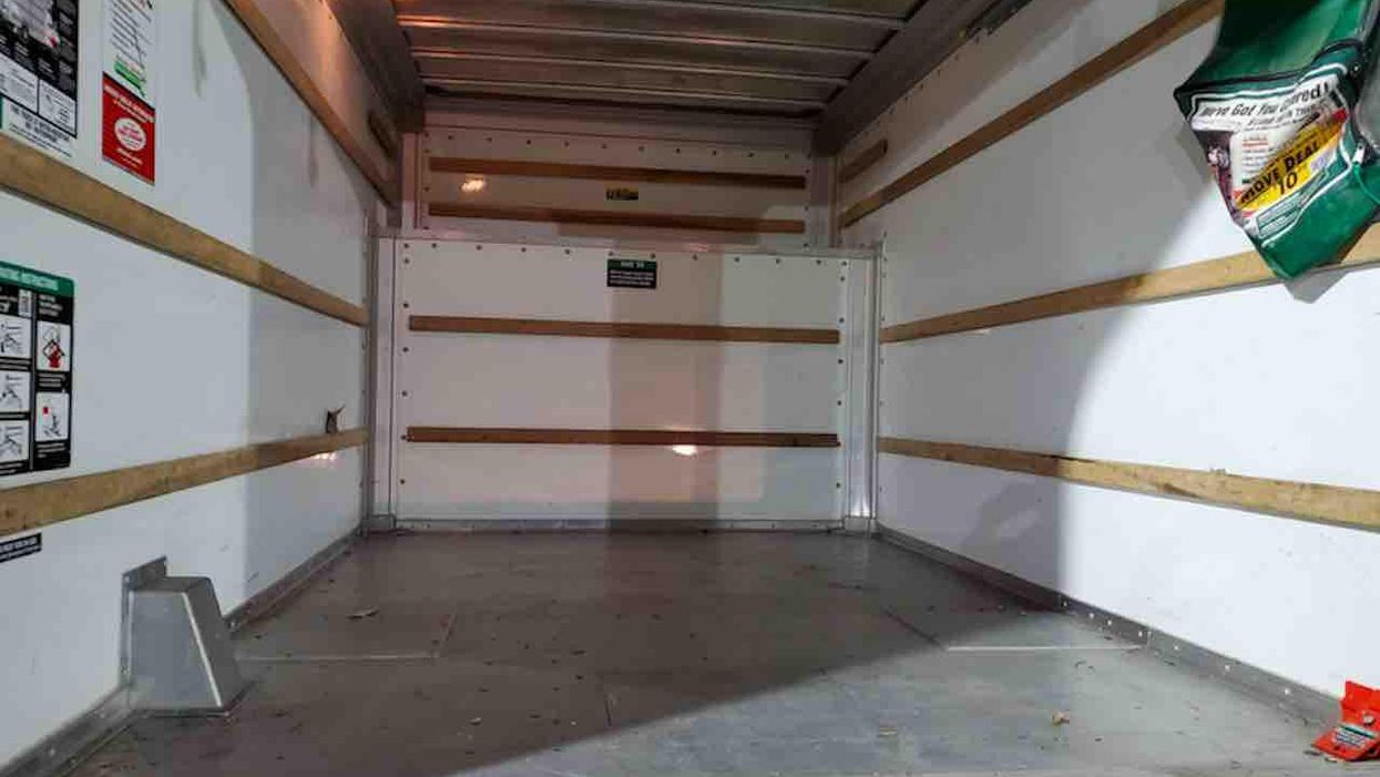 After cops take guns, drugs from squatter-occupied home, intruders are out of jail and loading other items from home into U-Haul — as police helplessly watch