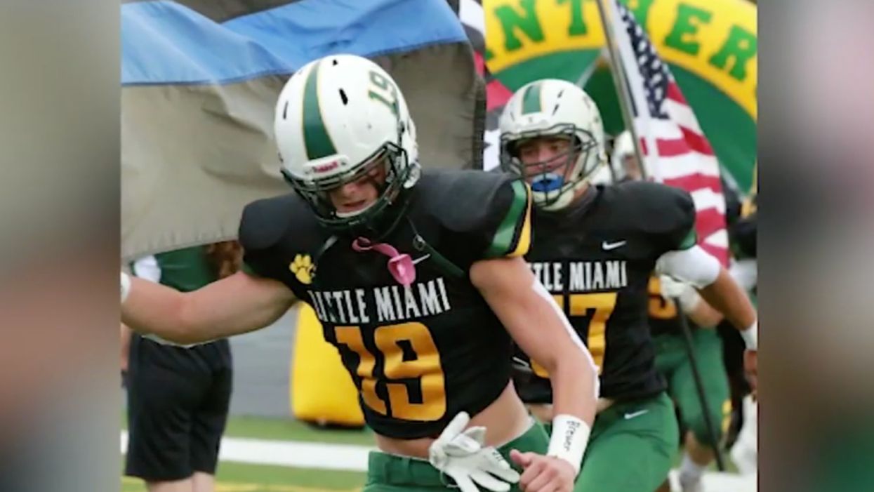 After high school suspends football players for carrying Thin Blue, Red Line flags, a local group awards scholarships to the two teens
