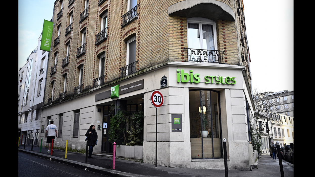 American 'gap year' student arrested after her newborn baby was thrown out of Paris hotel 2nd-floor window and died