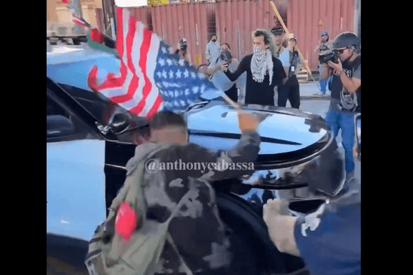 Anti-ICE agitator acts hurt after being 'ran over' by LAPD — but video shows the real story