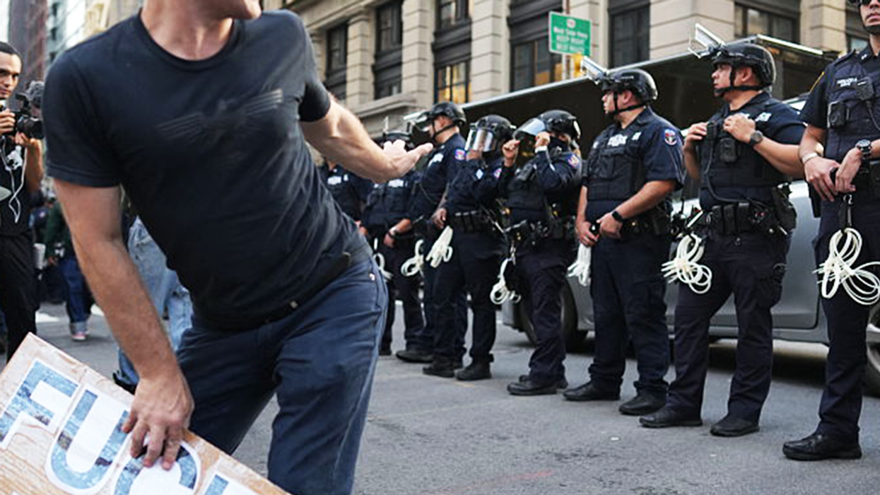 Anti-ICE protester exposed as serial left-wing activist since 1980s, protested at 'Dyke' march and against Coca-Cola