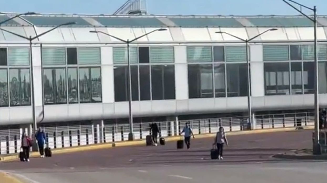 Anti-Israel activists block roadways at O'Hare, forcing travelers to walk a fair distance to try to catch their planes