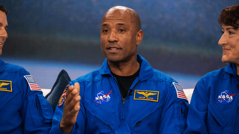Artemis II pilot Victor Glover tells schoolkids to put teamwork over race