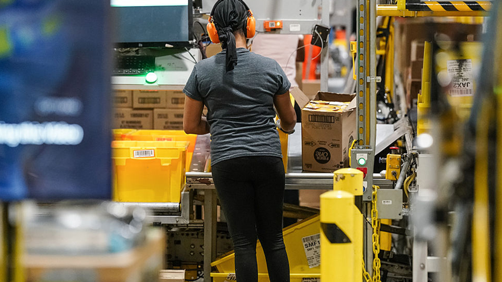 As AI menaces jobs, Amazon announces thousands of cuts