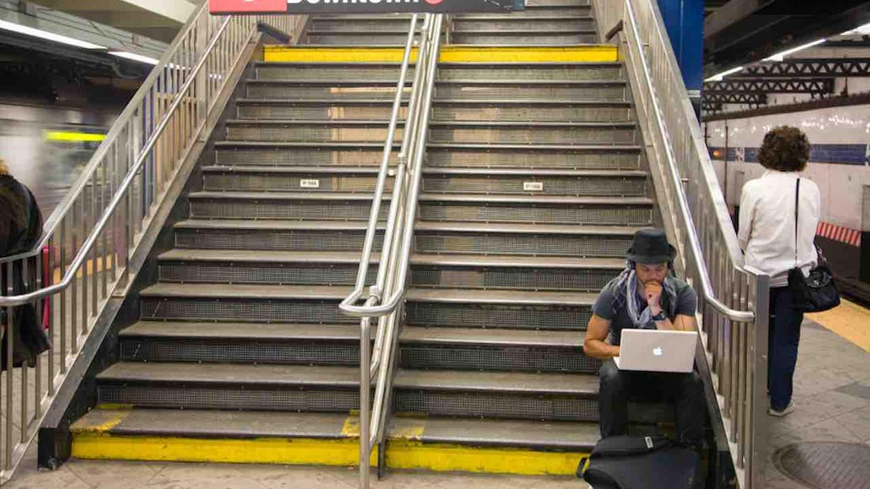 Asian-American woman who's running for NYC council says she was shoved on subway stairwell, sprained her ankle