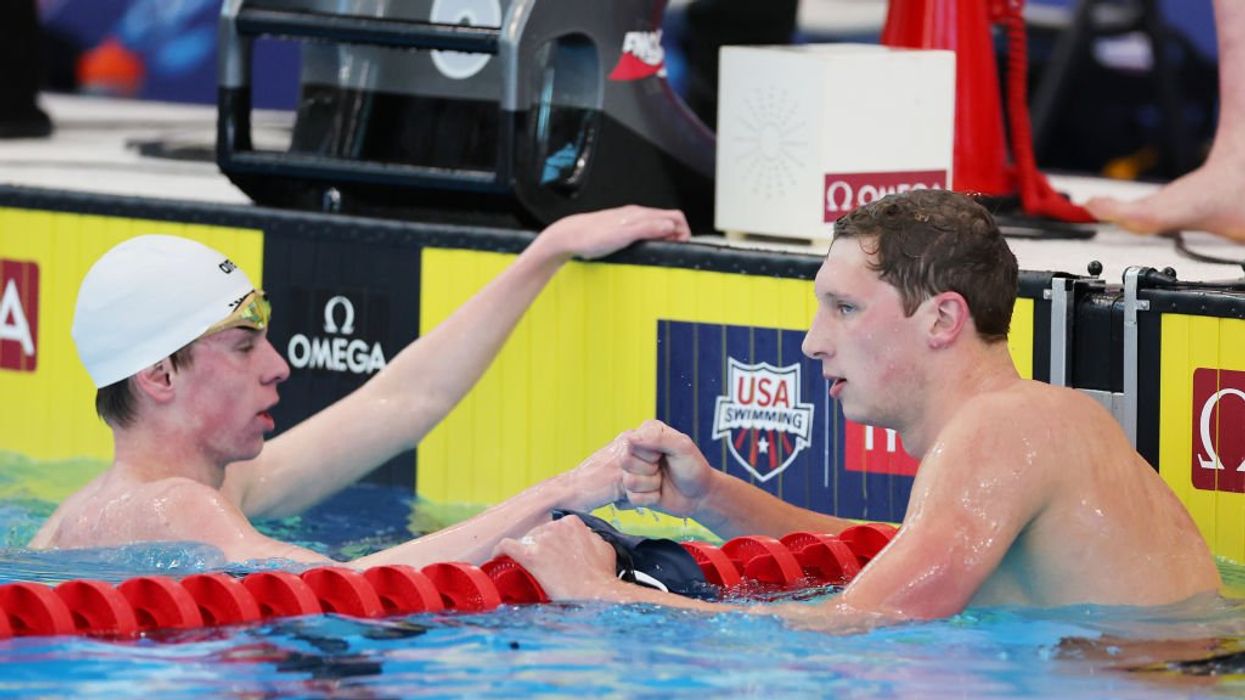 At least 4 Olympic swimmers, including 2 Americans, test positive for COVID-19 but aren't sent home