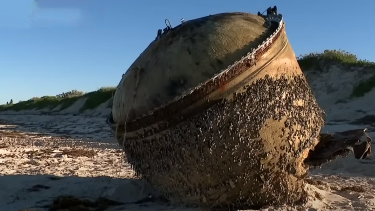 Australian Space Agency investigates UFO that washed up on beach, experts point to satellite rocket