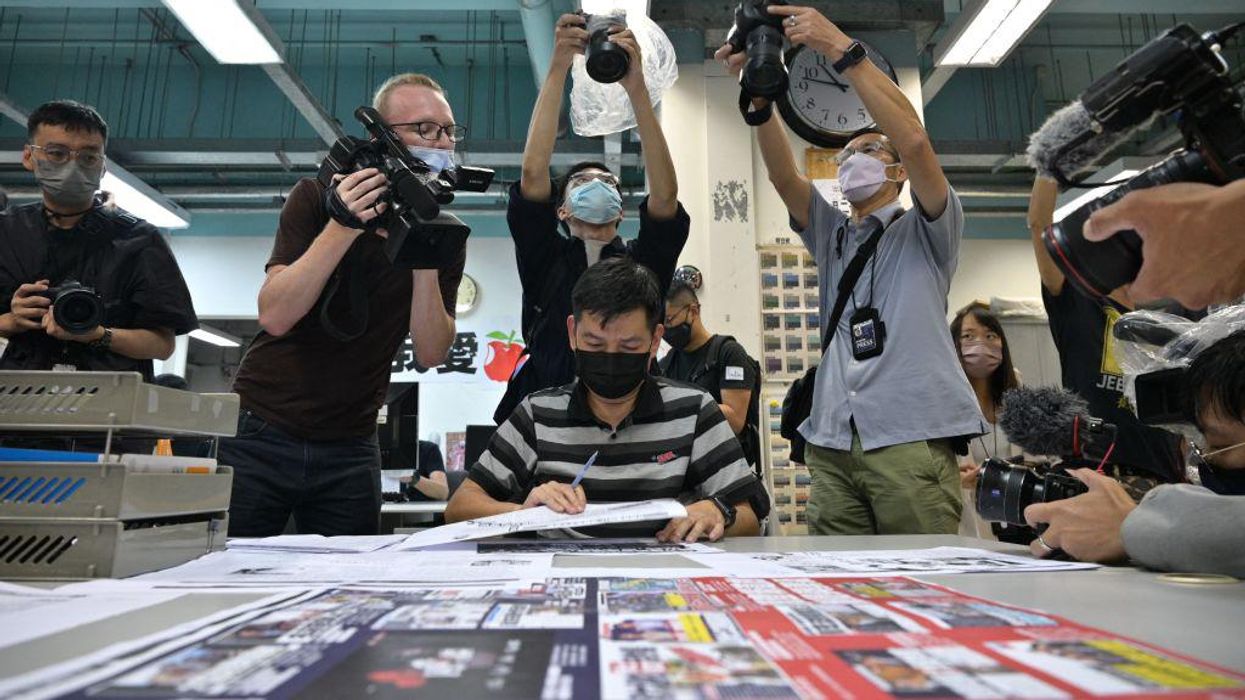 Authorities arrest Apple Daily senior editor, other journalists in Hong Kong under Beijing-imposed national security law
