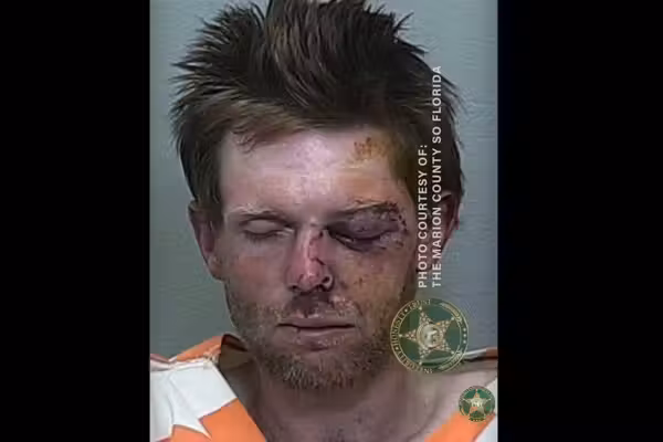 Axe-wielding thug allegedly threatens Florida car-wash employees — then 1 victim violently turns the tables on him