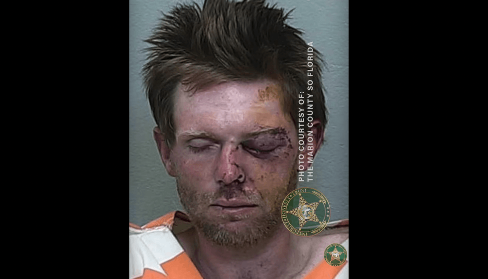 Axe-wielding thug allegedly threatens Florida car-wash employees — then 1 victim violently turns the tables on him