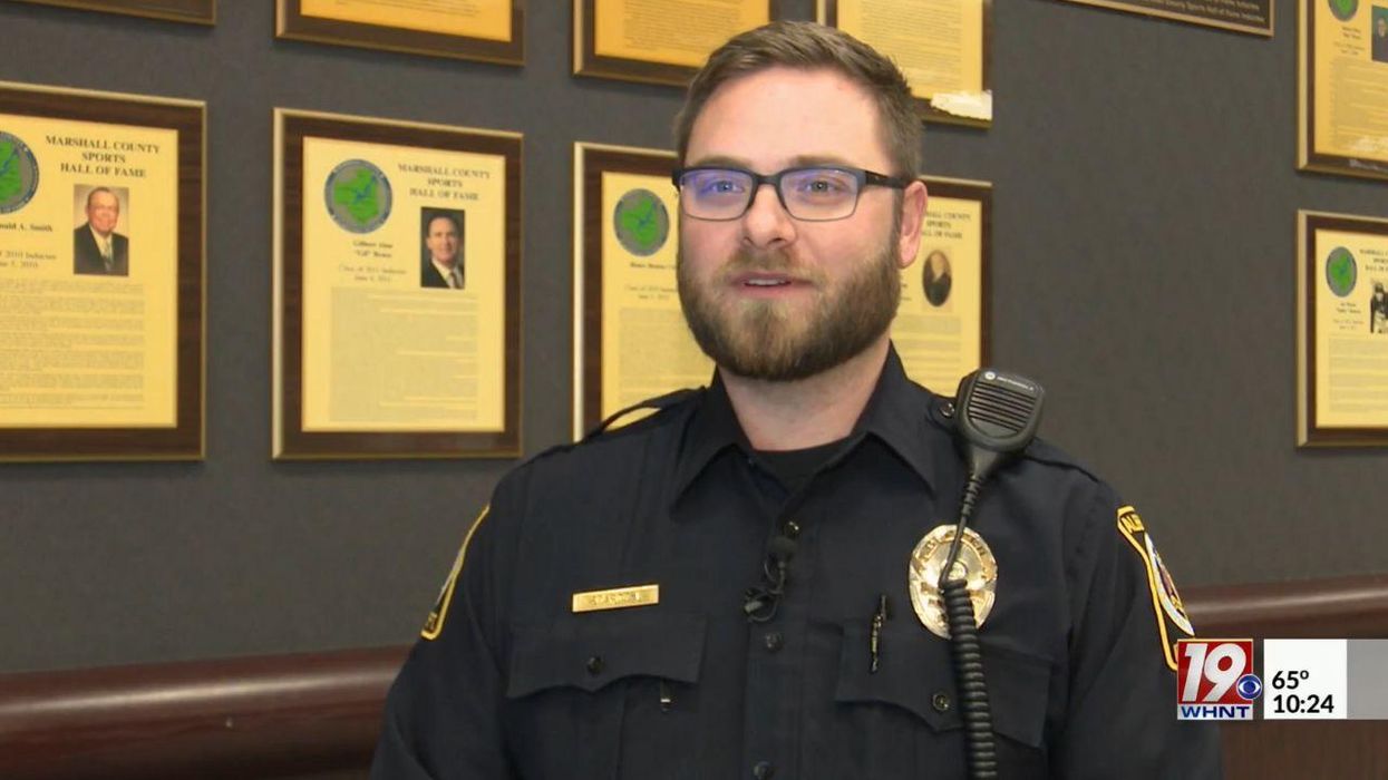 Baby starts choking during school game, mom frantically flags down resource officer, who jumps into action