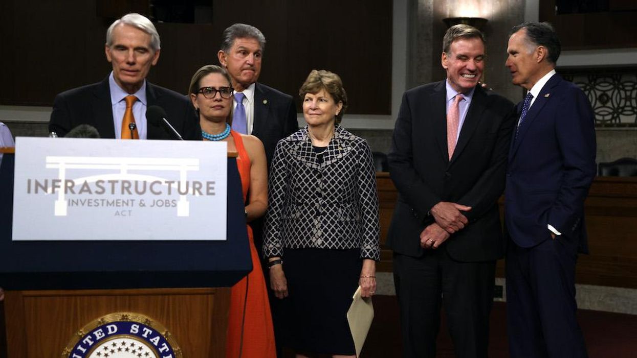 Backers of $1T infrastructure bill claim it's fully paid for, but CBO says bill will add $256 billion to deficit. Senators now rushing to get it passed.