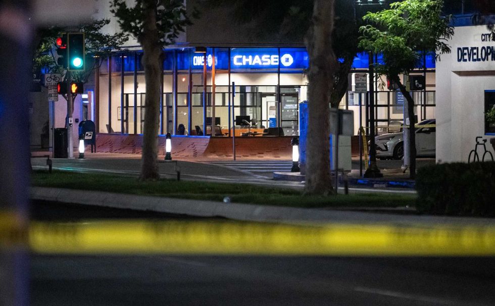 Bank customer armed with a gun turns the tables on alleged robber armed with a knife — permanently