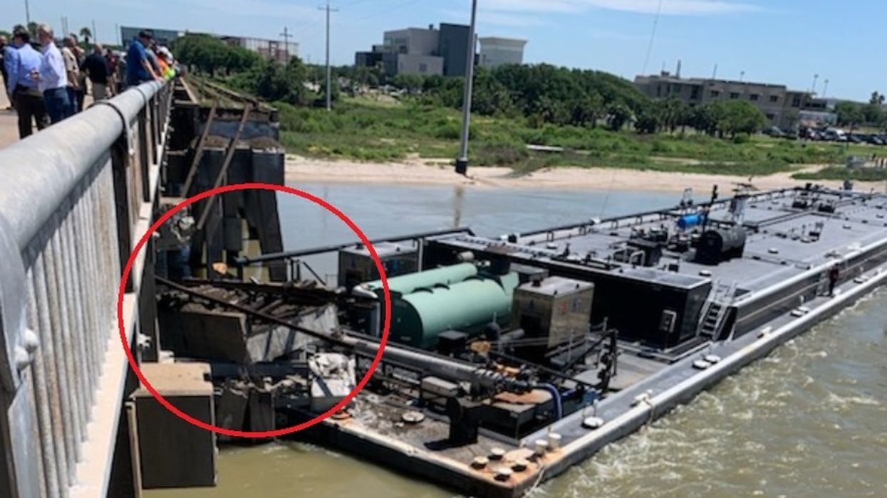 Barge strikes Galveston bridge, causing oil spill, power outage, and traffic shutdown