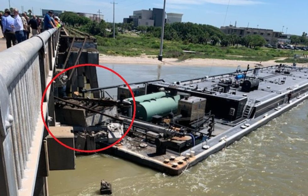 Barge strikes Galveston bridge, causing oil spill, power outage, and traffic shutdown