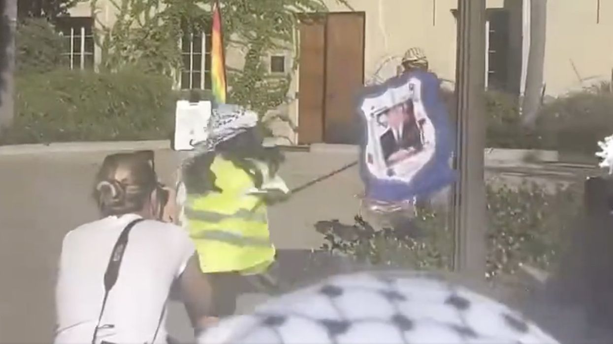'Beat that f***in' Jew!' Pro-Palestinian protesters take turns battering Netanyahu piñata at UCLA amid ecstatic cheering
