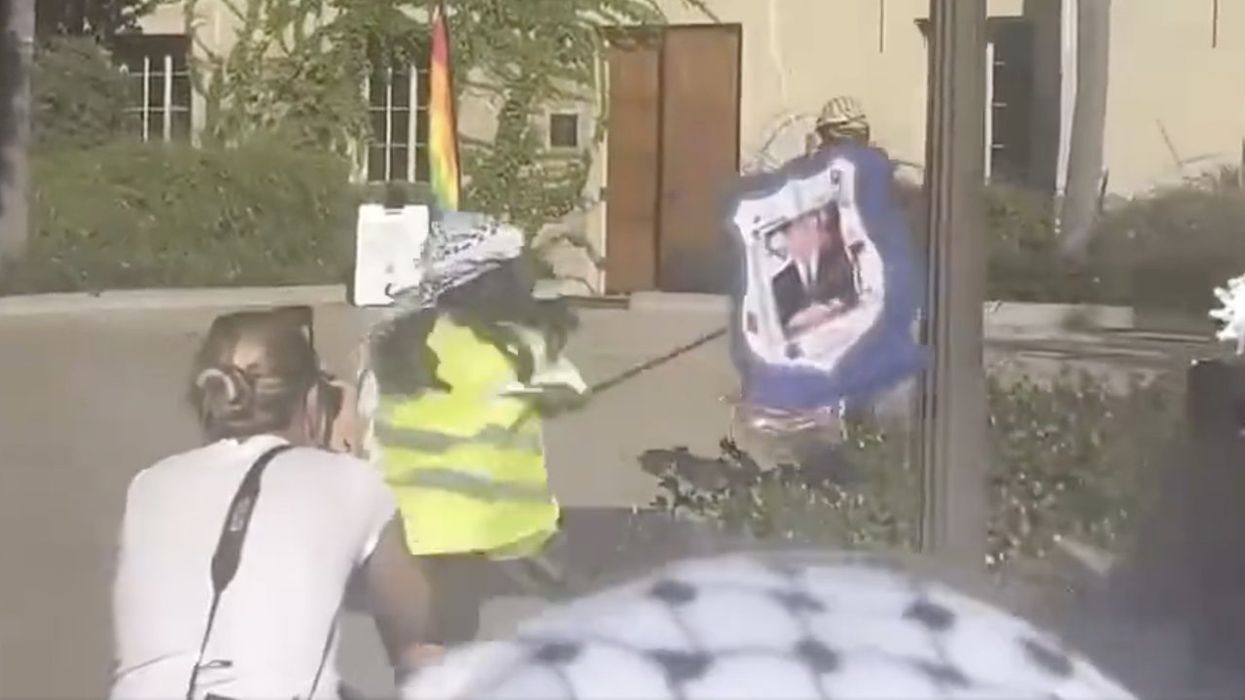 'Beat that f***in' Jew!' Pro-Palestinian protesters take turns battering Netanyahu piñata at UCLA amid ecstatic cheering