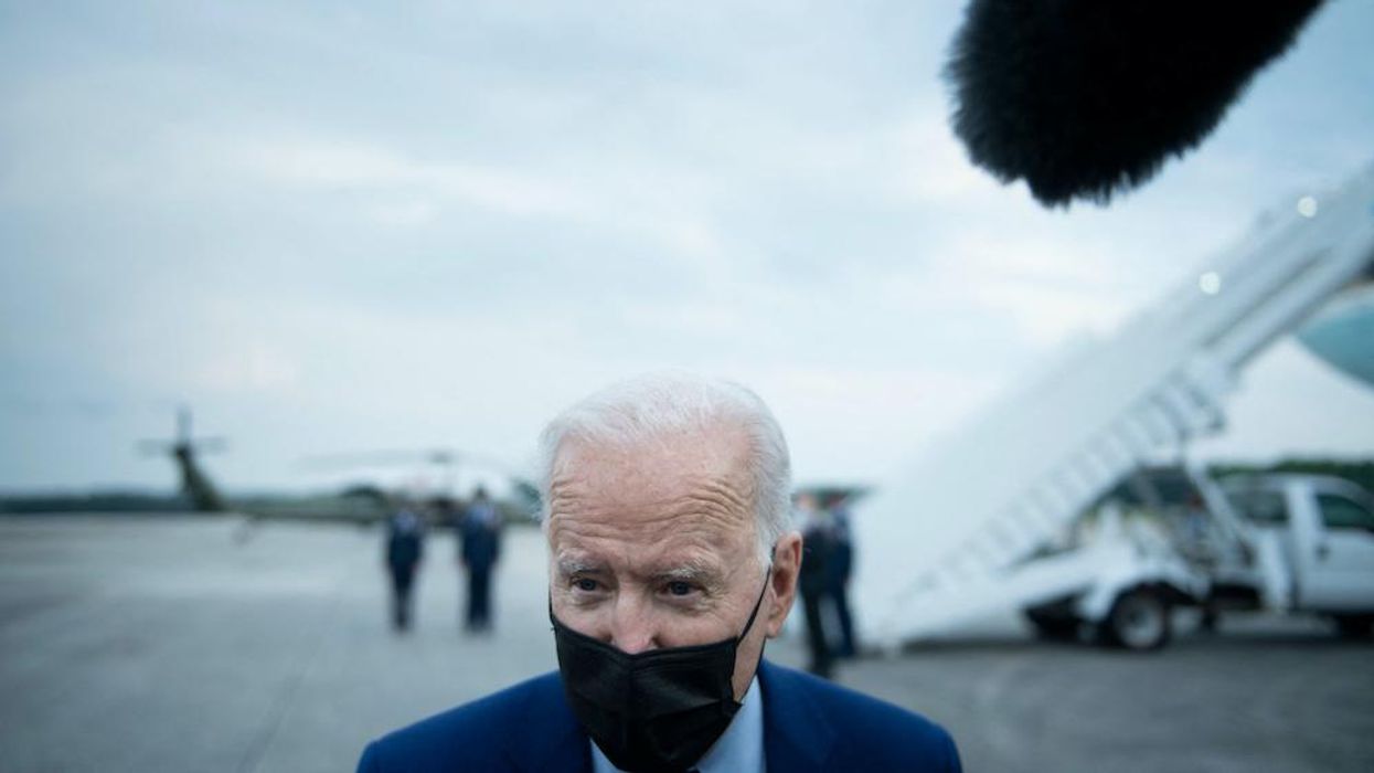Biden says he will ignore CDC guidance on masks for vaccinated people and will wear a mask — even outdoors: 'It's a patriotic responsibility for God's sake'