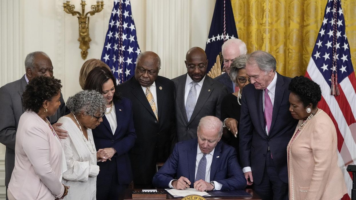 Biden signs legislation making Juneteenth a national holiday
