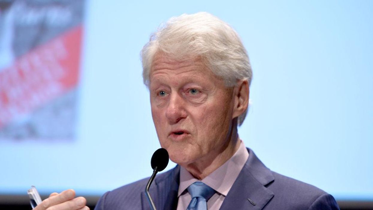 Bill Clinton's former 'right-hand man' claims the president visited Epstein's Island in 2003