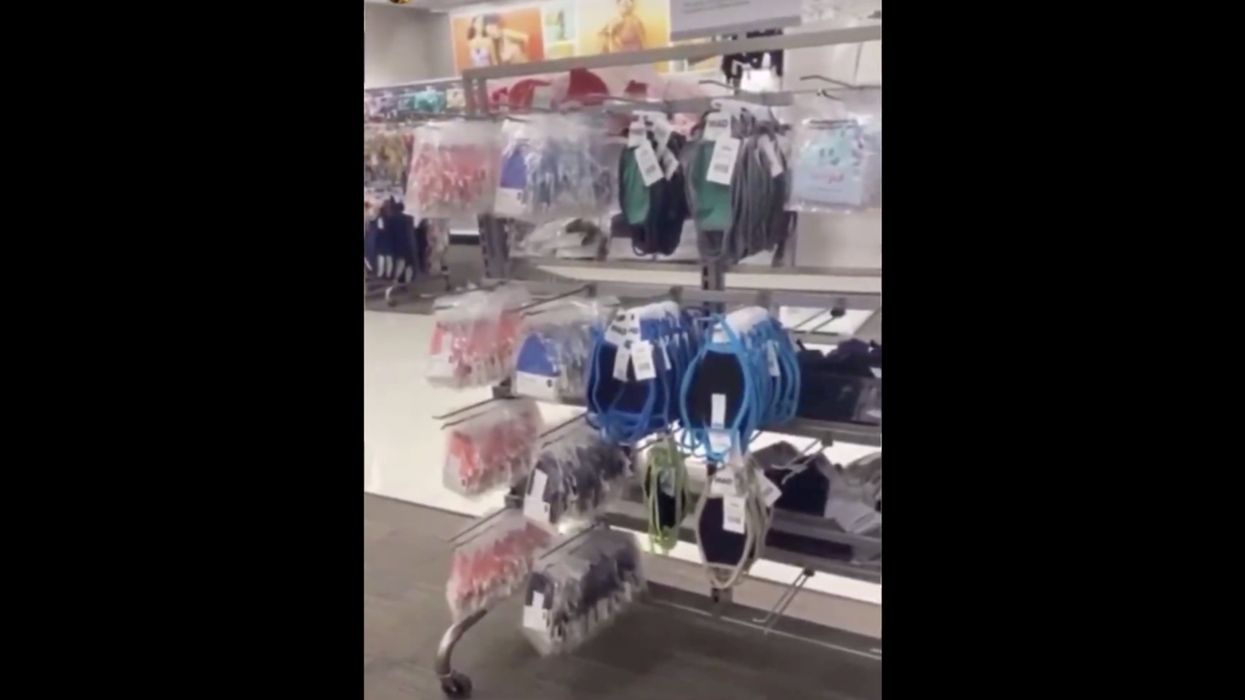 Bizarre viral video shows woman  wearing '$40,000 Rolex' and trashing face mask display at Target