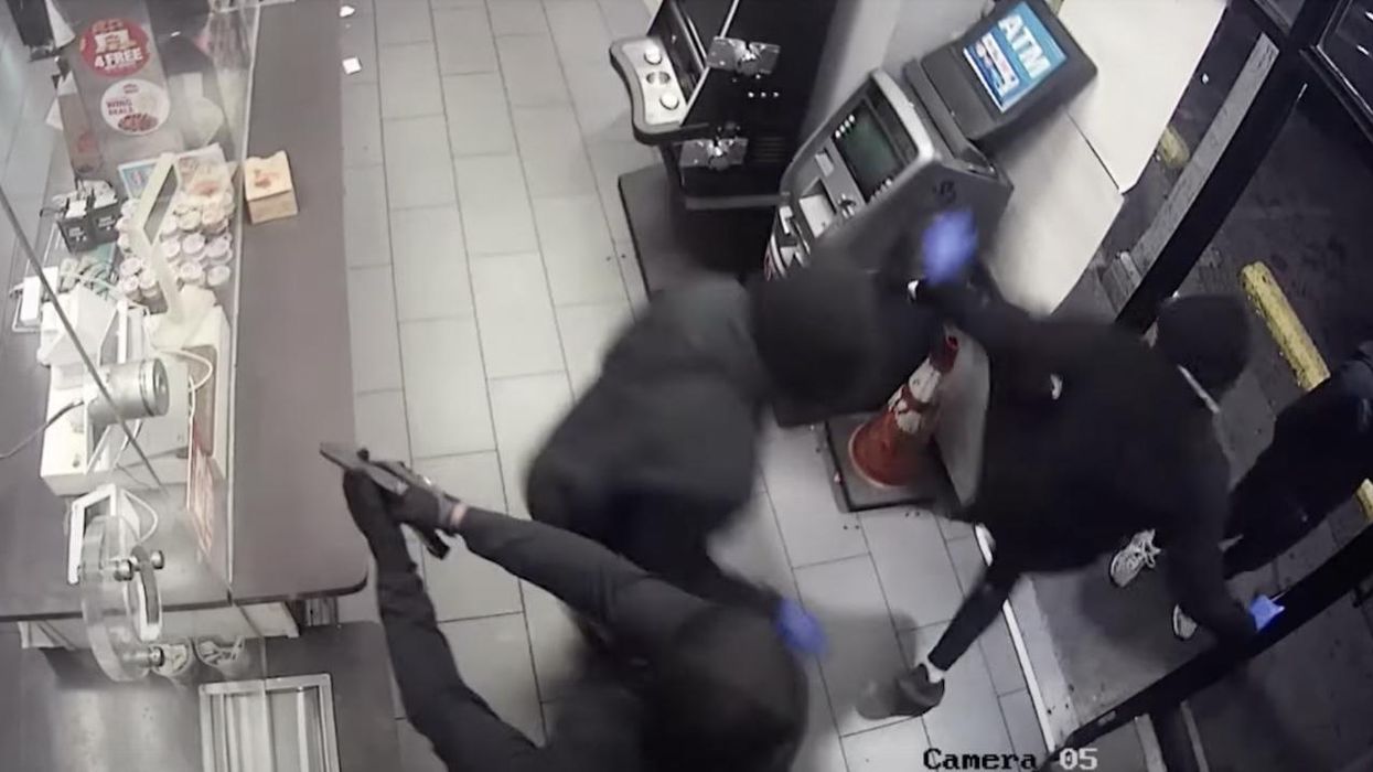 Black-clad wannabe thugs — at least one of them armed — try their hands at ripping off Philly ATM. Despite their earnest kicking and pounding, it's a hilarious fail.