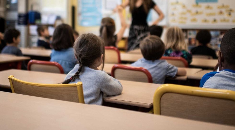 Black elementary school teacher posted alleged anti-white threats on social media