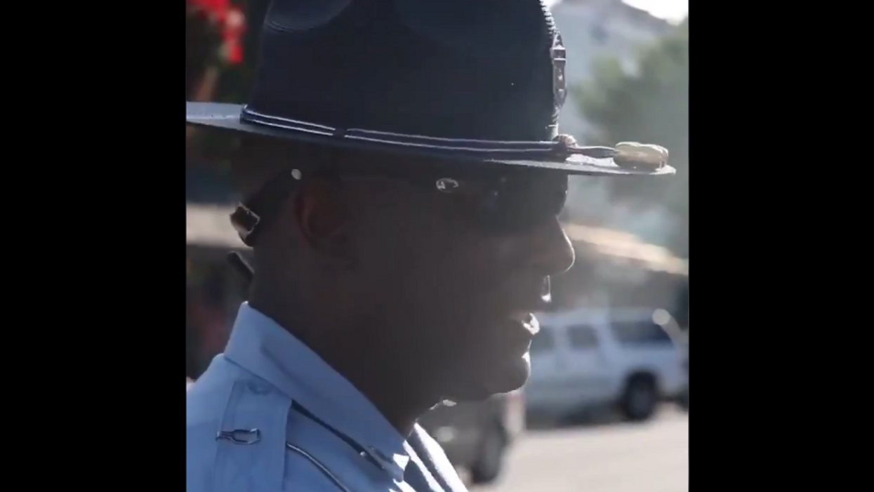 Black Georgia state trooper refuses to kneel at a Black Lives Matter protest