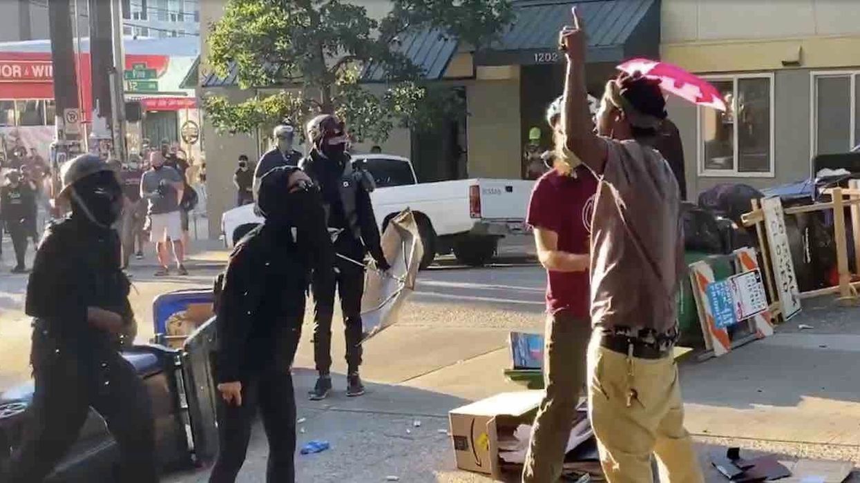 Black man chants 'All Lives Matter!' as white Seattle leftists try getting him to stop