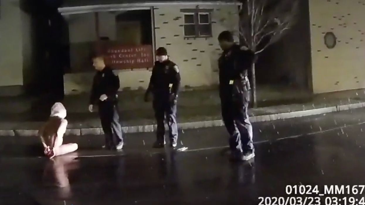 Black man dies after police place him in spit hood, press face into pavement. Family demands cops be charged with murder, releases the body cam footage.