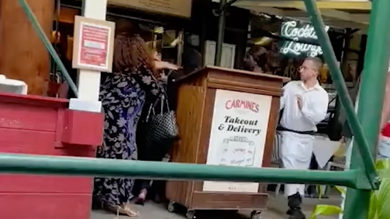 BLM protests vaccine mandates outside Carmine’s NYC after women attacked restaurant hostess over vax passport questions. Carmine’s hits back.