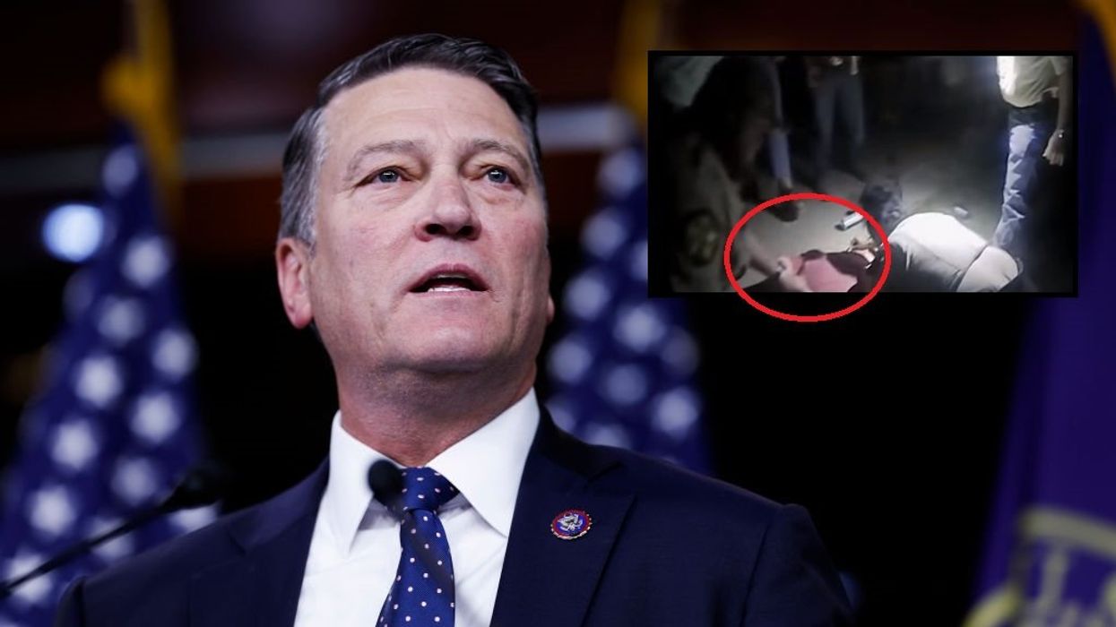 Bodycam video shows cops wrestle Rep. Ronny Jackson to ground, place him in handcuffs after he tries to aid teen in medical distress at rodeo: 'This is f***ing ridiculous'
