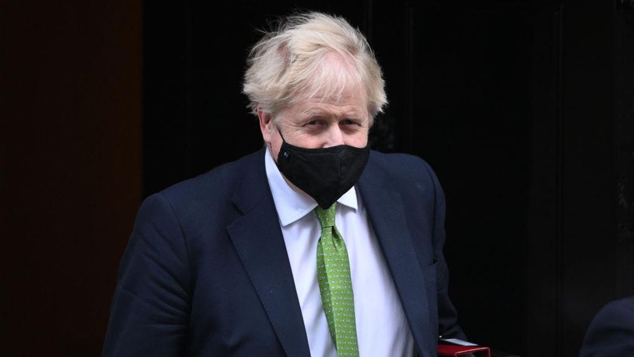 Boris Johnson ends England's COVID restrictions, including mask mandates and vaccine passports, amid scandal