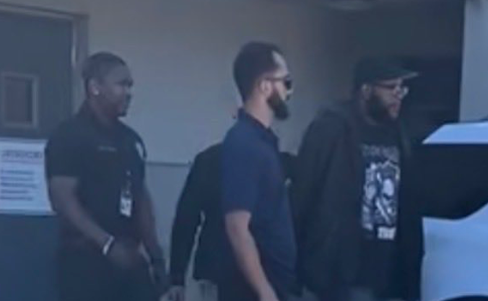 Bouncer caught on video smashing male's head through car window, putting him in chokehold. But cops get a break in the case.