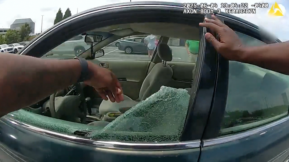 'Break it!' Bodycam video shows moment cops save crying little kids locked in dangerously hot car for nearly an hour