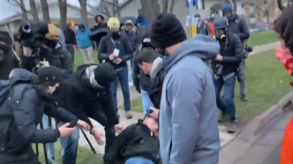Brooklyn Center protesters pelt CNN crew with water bottle and eggs, chase them away: 'Get the f*** out of here!'