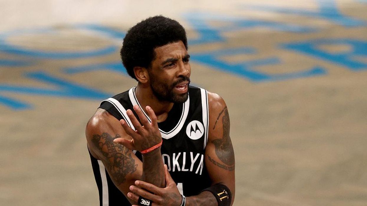 Brooklyn Nets ban Kyrie Irving from team over his COVID vaccine refusal