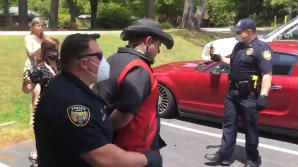 Business owner arrested for reopening tattoo shop amid North Carolina's stay-at-home order