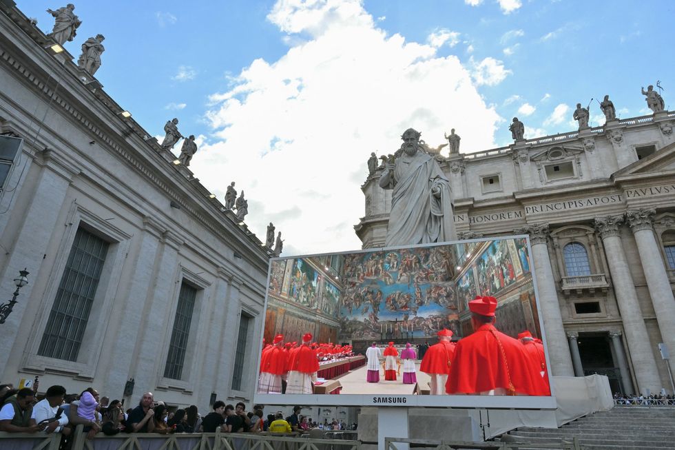 Cardinals have chosen a new pope; white smoke emerges from Sistine Chapel