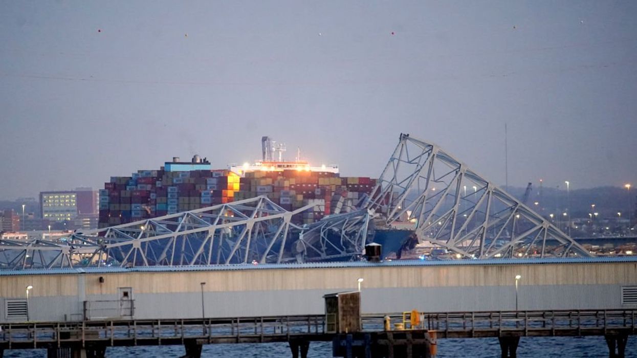 Cargo ship rams into major Baltimore bridge, causing total collapse