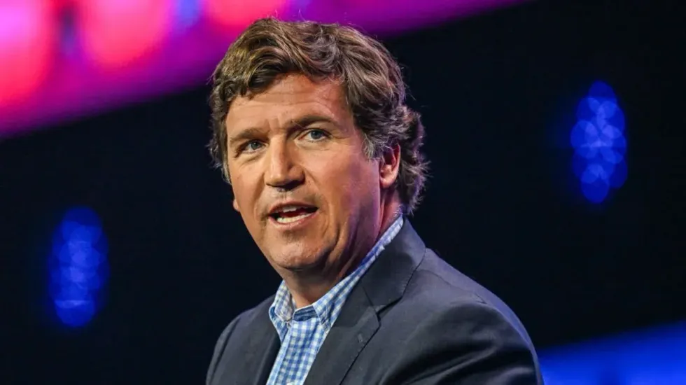 'Castrated robots': Tucker Carlson dismantles liberal journalist in front of Aussie crowd