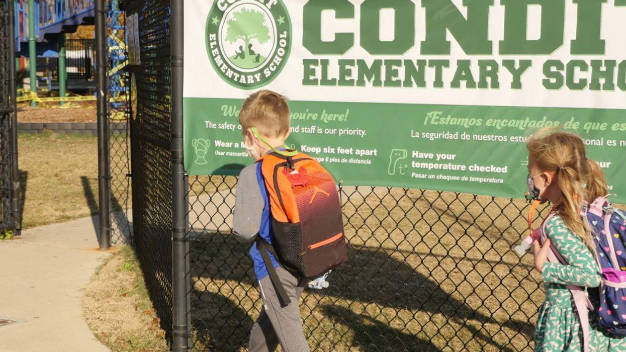 CDC clarifies: Schools must continue to make kids wear masks for now