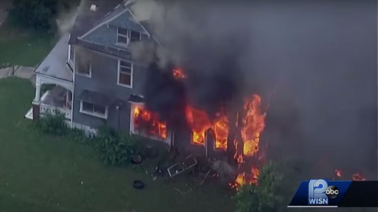 Chaos erupts during search for missing girls: Mob hurls bricks at cops, burns down home, shoots teens