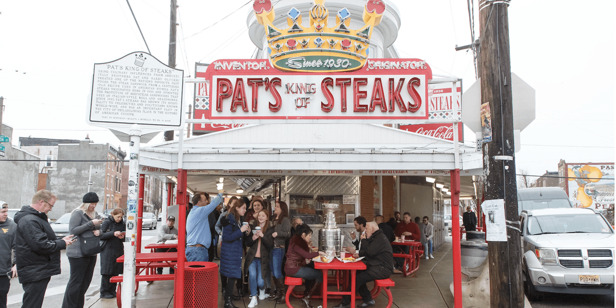 Cheesesteak scrap! Hooded punk caught on video chucking sandwich at manager of famous Philly cheesesteak stand. Yuge mistake.